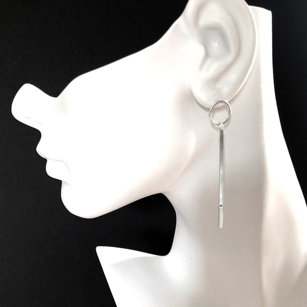 Silver bar earrings with diamonds by eko jewelry design, Belen on model