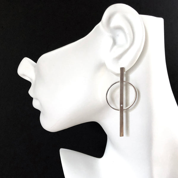 Silver hoop bar earrings with diamonds by eko jewelry design, Soraya on model