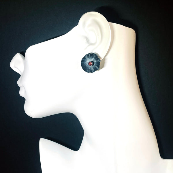 Sliver flower earrings with garnet by eko jewelry design, Carmella on model