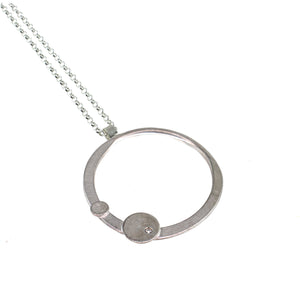 Sterling silver circle necklace with a diamond by eko jewelry design, Thebe